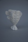 Sponge form porcelain tealight.